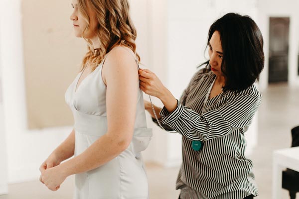 Angela Kim in a fitting session with a bridal client