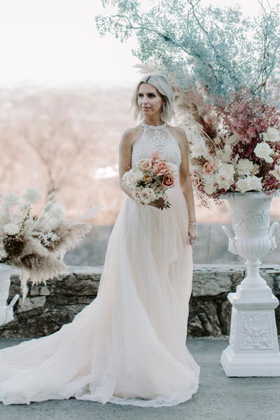 Albina wearing her custom bridal gown from Angela Kim