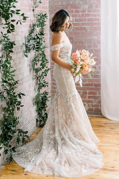 Hannah wearing her custom wedding dress from Angela Kim Couture