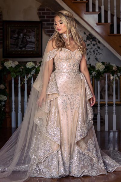 Natalia wearing her custom wedding dress from Angela Kim Couture
