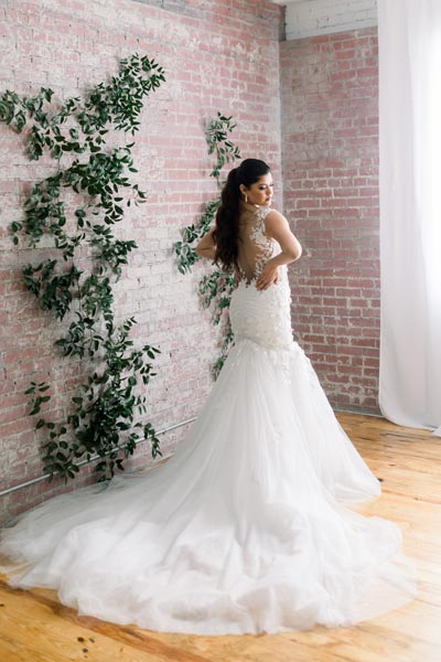 Sofia wearing her custom bridal gown from Angela Kim Couture