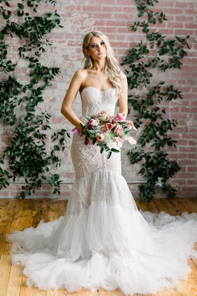 Veronica wearing hear custom wedding gown from Angela Kim Couture