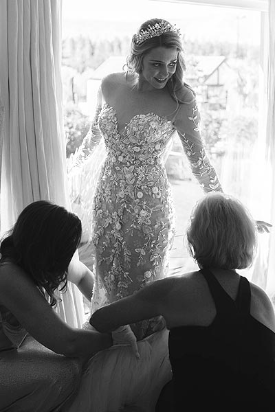 Angela Kim Couture bride getting styled in her custom wedding dress