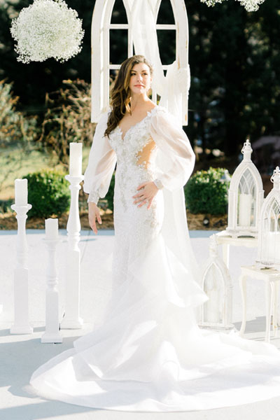 Lauren wearing her custom couture wedding gown from Angela Kim Couture