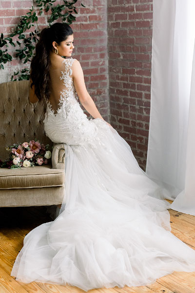 Sofia wearing her custom bridal gown from Angela Kim Couture