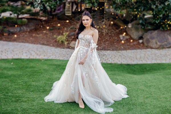 Masha wearing a couture wedding dress by Angela Kim