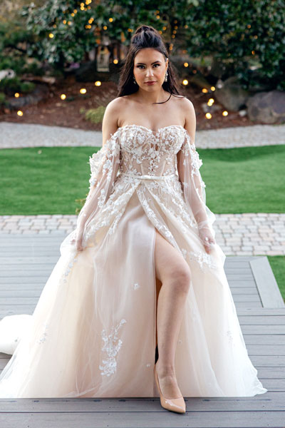Masha posing in a sexy romantic wedding dress