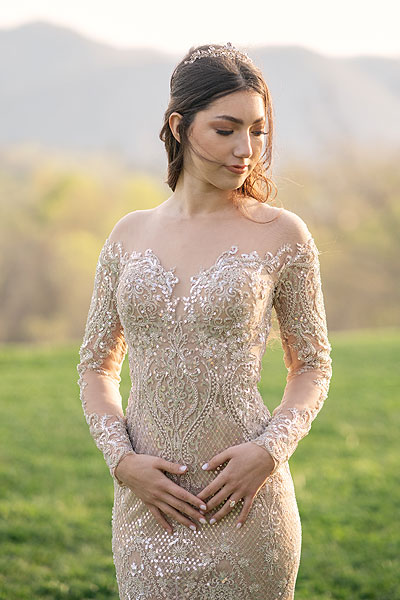 Evelina wearing her custom gold wedding dress
