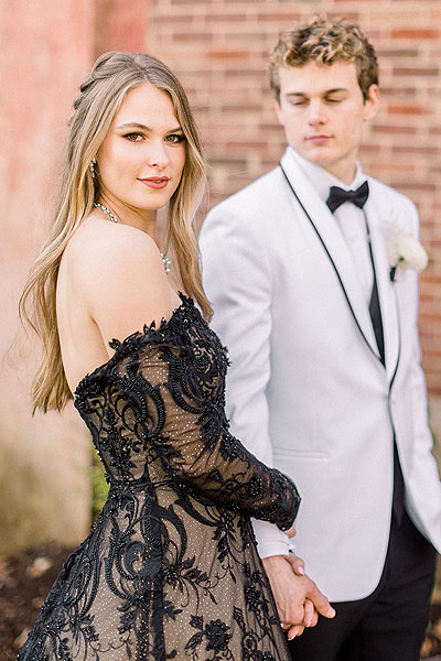 Payton looks lovely in an off the shoulder black wedding dress