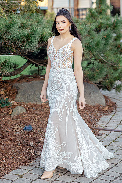 Masha wearing a custom lace wedding dress
