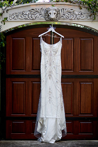 Sherri's custom wedding dress on a hanger