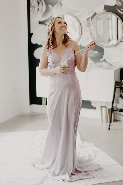 Madison wearing he silk lilac wedding gown
