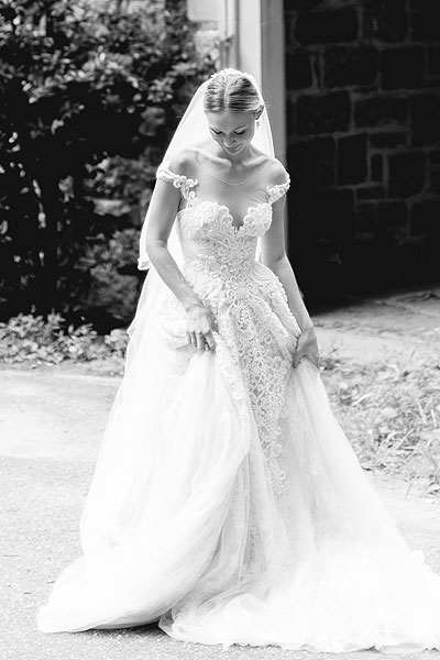 Natalie wearing her wedding gown from Angela Kim Couture