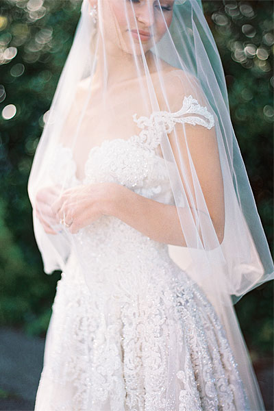 Natalie wearing her gown and veil