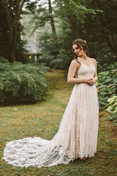 Kate posing in her custom bridal gown