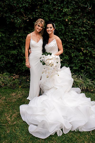 Chelsea in her wedding gown with her mother
