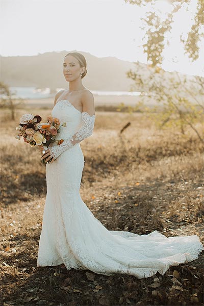 Jessica posing in her wedding dress