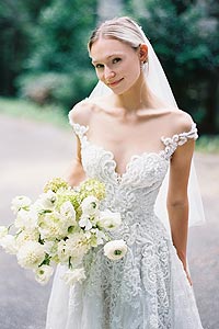 Natalie in her custom lace wedding gown