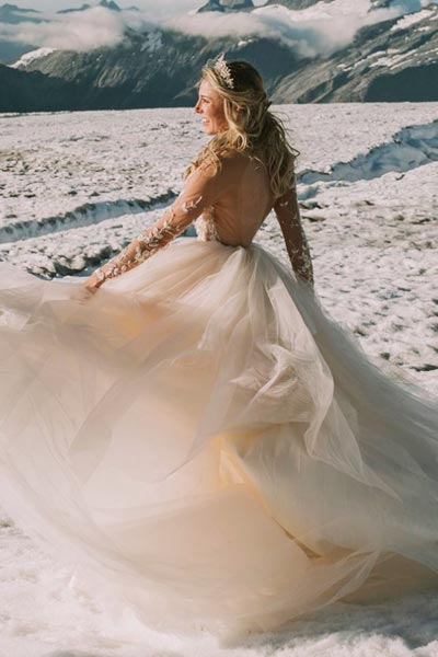 Breigh in her custom open back wedding dress