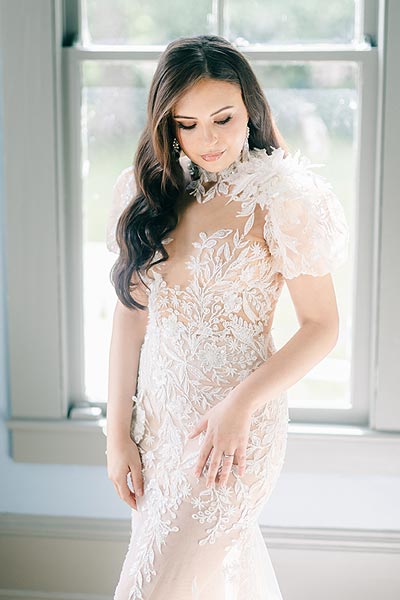 Masha posing in her custom summer wedding dress