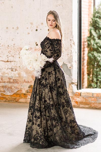 Payton in her black wedding dress with a straight neckline