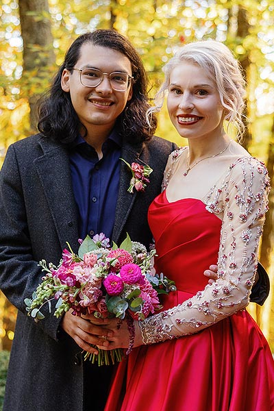 Sunny and Ed posing for a wedding portrait