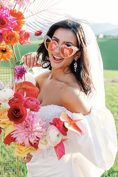 Veronica smiling and posing for wedding photos