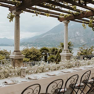 Italian wedding table setting in the mountains by the ocean.